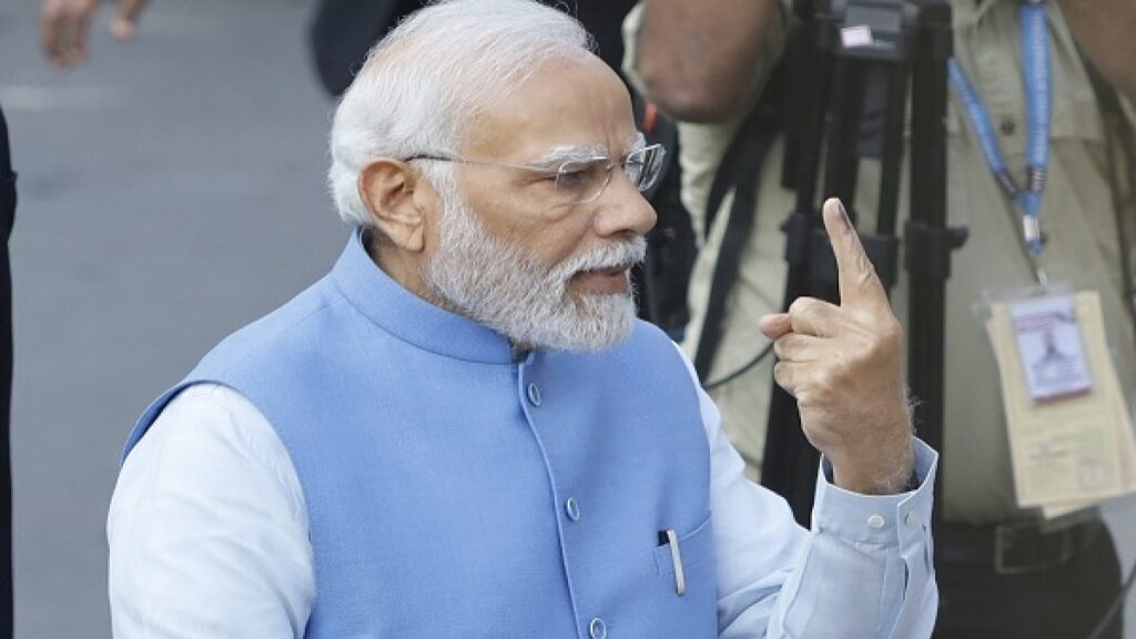 PM Narendra Modi cast his vote in Ahmedabad