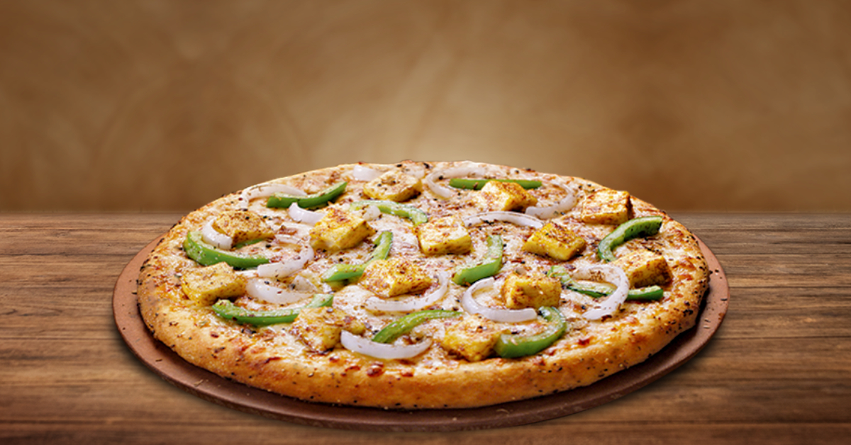 Dominos Pizza: పిజ్జా ప్రియులకు గుడ్ న్యూస్.. సగానికి సగం తగ్గిన డొమినోస్ పిజ్జా ధరలు